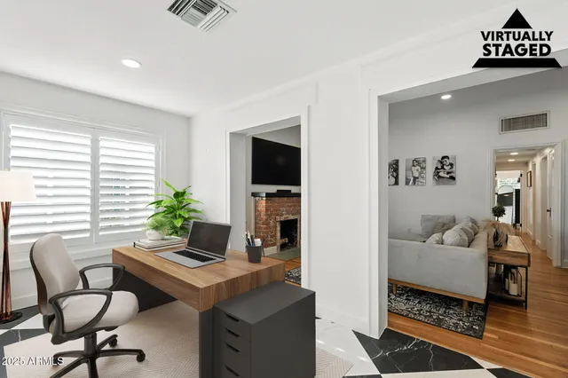 a kitchen with a sink a counter cabinets and appliances