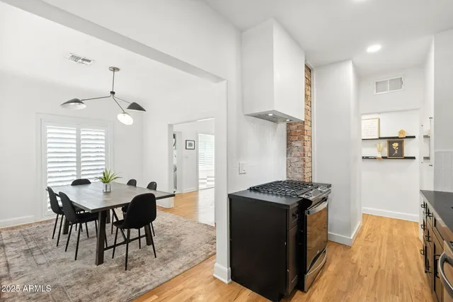 a bathroom with a bathtub and a sink