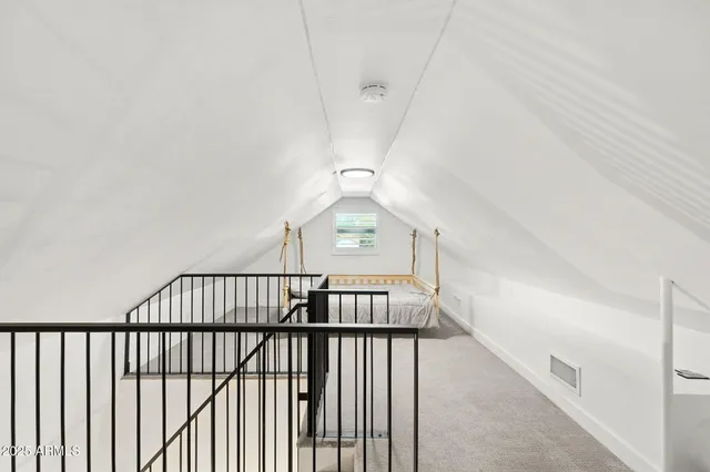 a front view of a house with a large window