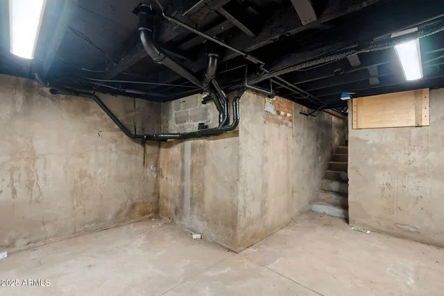 an aerial view of residential building with parking space