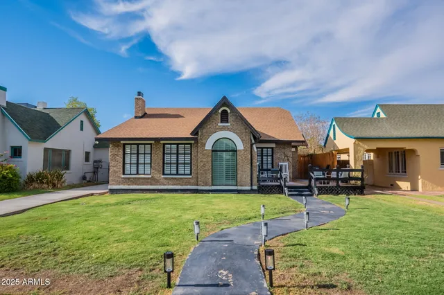 a outdoor space with patio the couches and pool with wooden floor