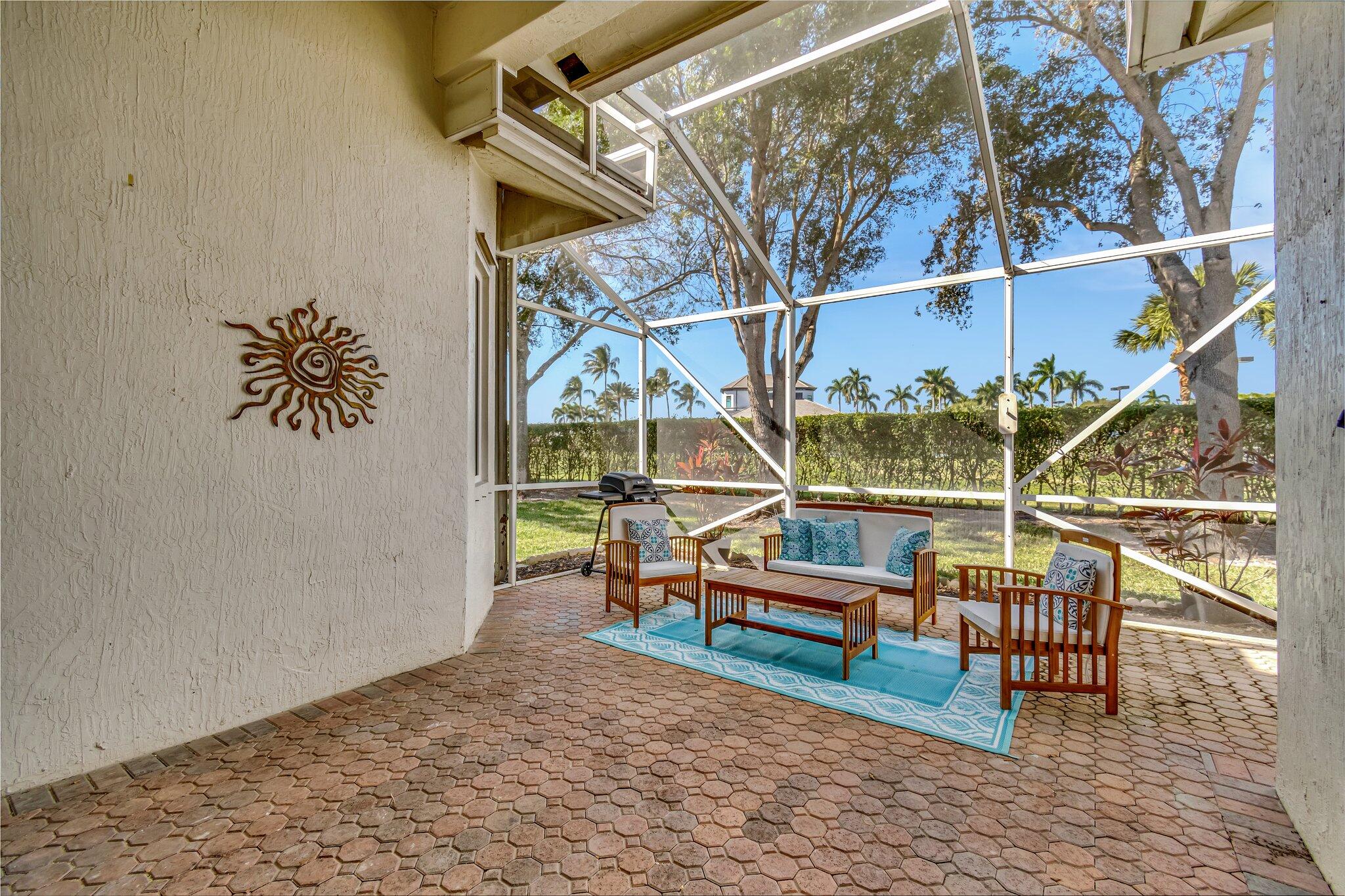 8239 Marsala Way Boynton Beach, FL 33472 - Photo 40 of 68 Roofed & Screened Patio