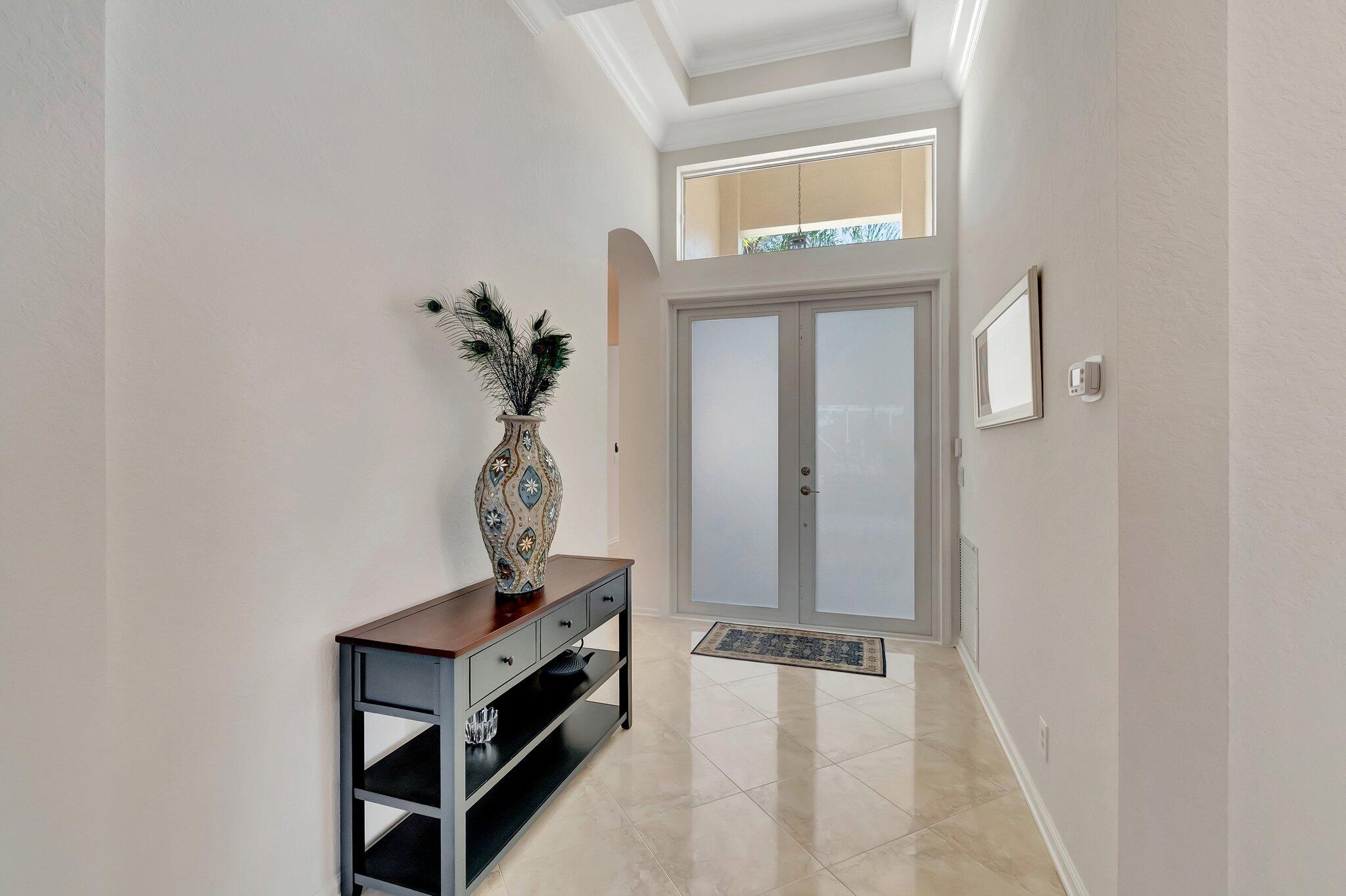 8239 Marsala Way Boynton Beach, FL 33472 - Photo 5 of 68 a view of a hallway with entryway