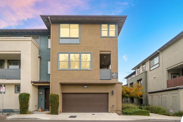 a front view of a house with a garage