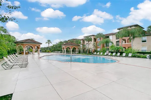 a view of multiple houses with a yard