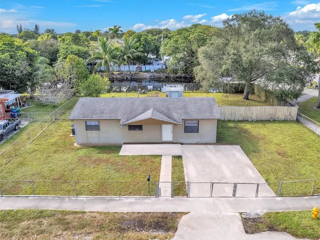 a view of a house with a swimming pool