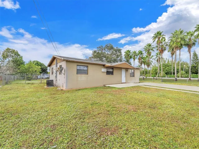 a house view with a garden space