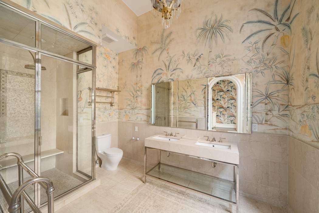 243 East 17th Street Manhattan, NY 10003 - Photo 21 of 44 a bathroom with a sink a toilet and shower