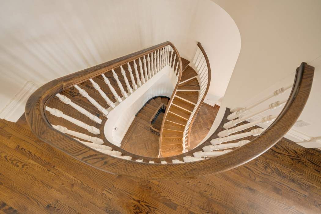243 East 17th Street Manhattan, NY 10003 - Photo 22 of 44 a view of wooden floor with staircase