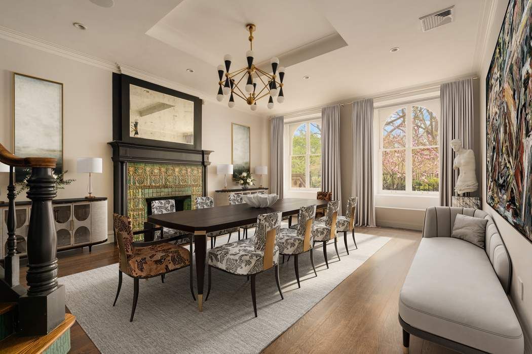 243 East 17th Street Manhattan, NY 10003 - Photo 3 of 44 a view of a dining room with furniture window and wooden floor