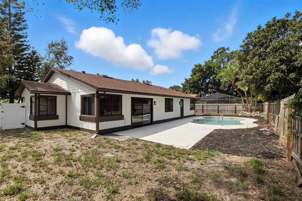 3441 Calgary Lane Mount Dora, FL 32757 - Photo 17 of 20 a view of a house with backyard