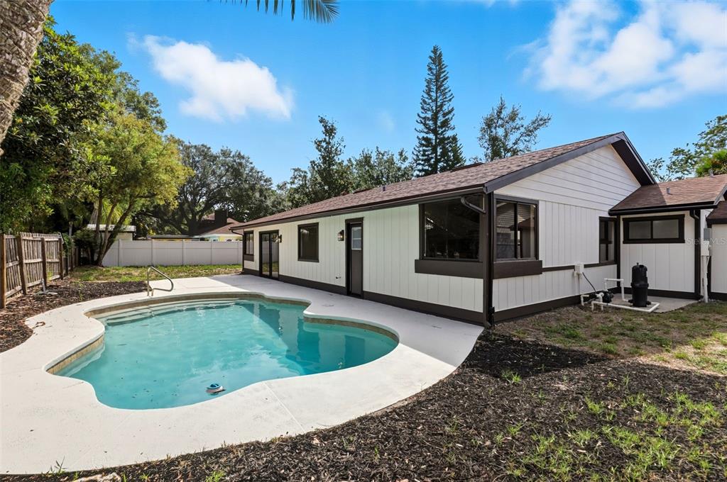 3441 Calgary Lane Mount Dora, FL 32757 - Photo 20 of 20 a view of a house with backyard and sitting area