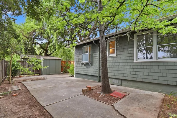 a backyard of a house with lots of green space