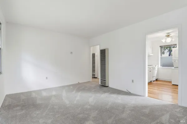 an empty room with a bathroom