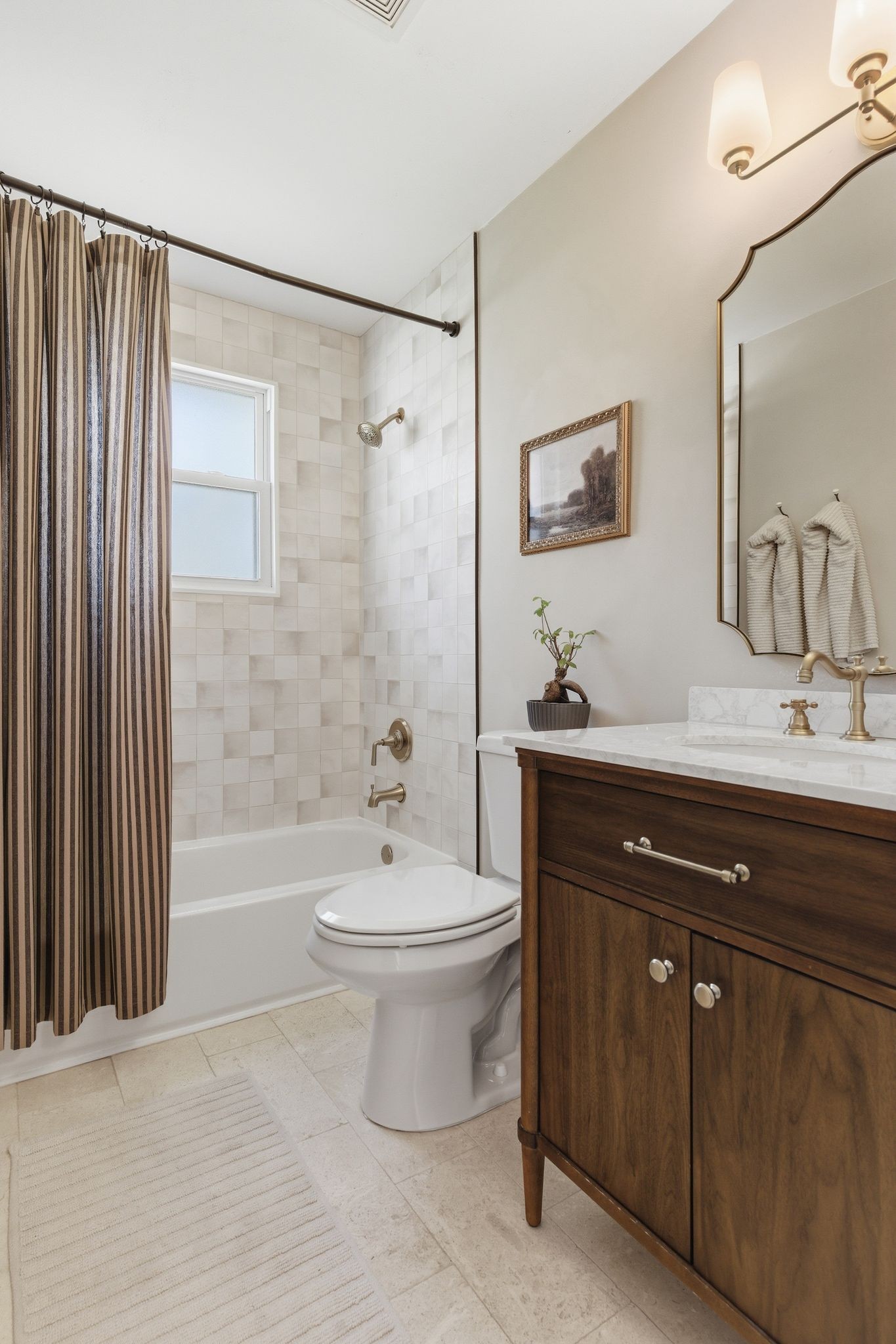 105 Regiment Court Franklin, TN 37064 - Photo 17 of 30 a bathroom with a bathtub shower sink mirror and toilet