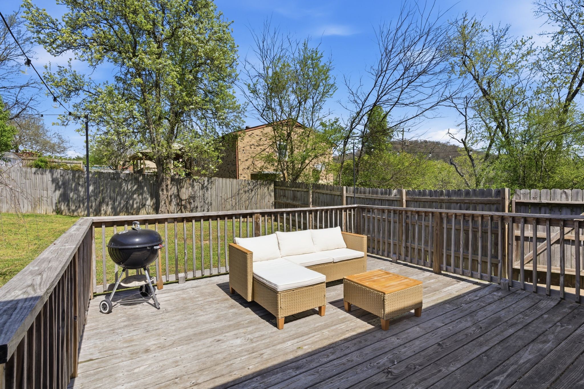 105 Regiment Court Franklin, TN 37064 - Photo 23 of 30 a view of a deck with two chair and wooden floor