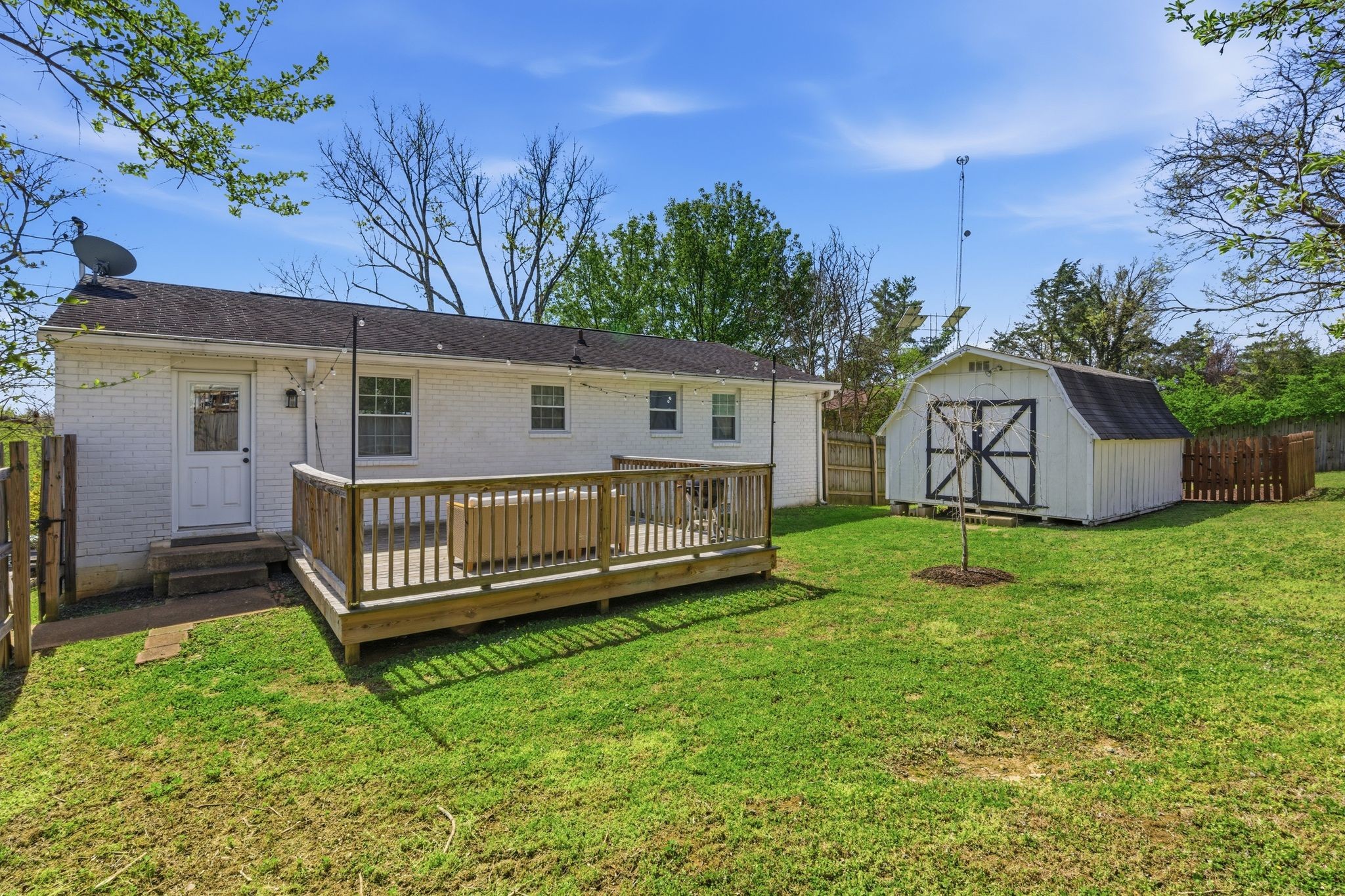 105 Regiment Court Franklin, TN 37064 - Photo 25 of 30 a view of a house with a yard and deck