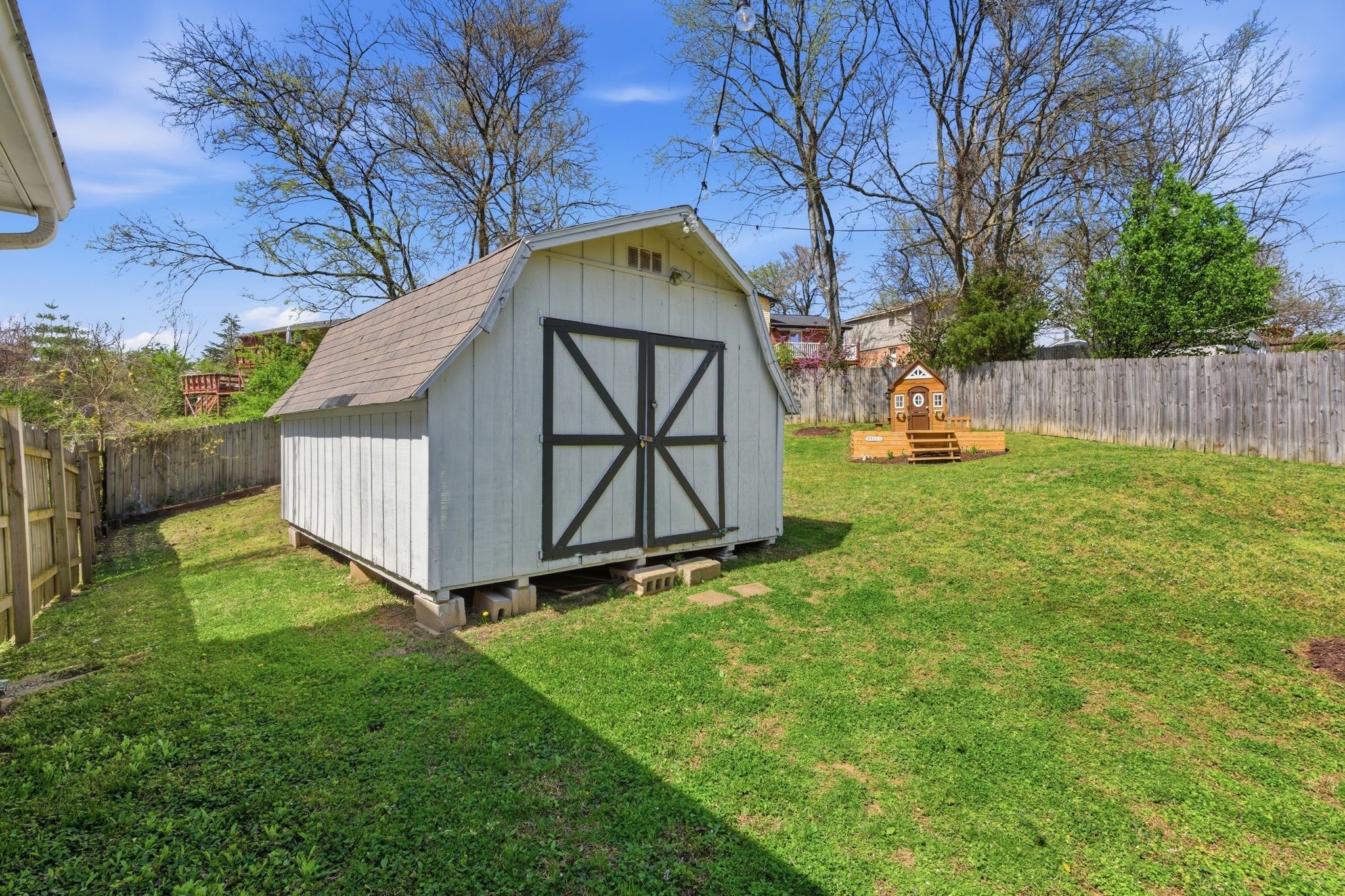 105 Regiment Court Franklin, TN 37064 - Photo 26 of 30 a backyard of a house with lots of green space
