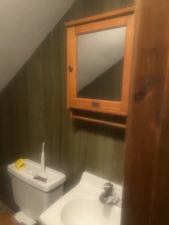 241 Sandisfield Road Sandisfield, MA 01255 - Photo 16 of 35 a bathroom with a toilet sink and mirror