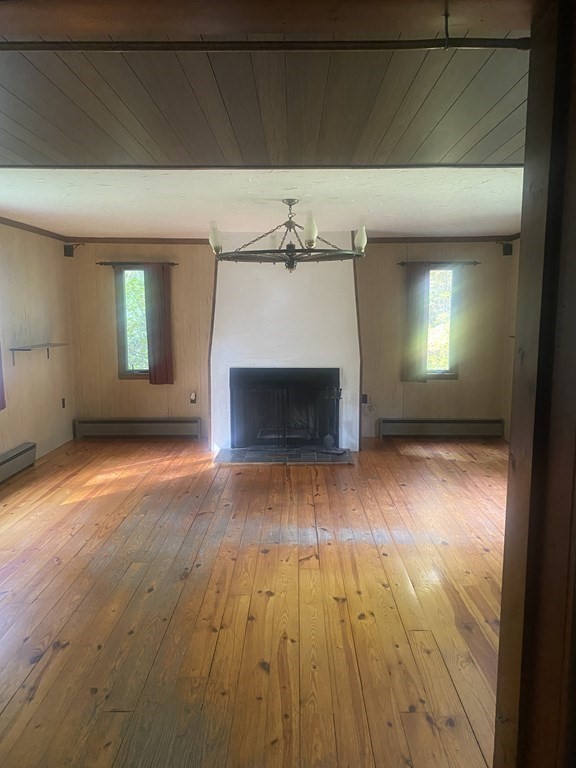 241 Sandisfield Road Sandisfield, MA 01255 - Photo 19 of 35 an empty room with a fireplace