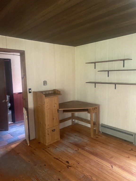 241 Sandisfield Road Sandisfield, MA 01255 - Photo 21 of 35 a view of a room with wooden floor