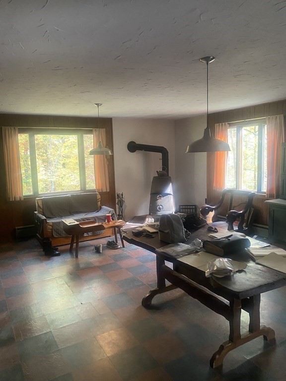 241 Sandisfield Road Sandisfield, MA 01255 - Photo 22 of 35 a living room with furniture a window and a lamp