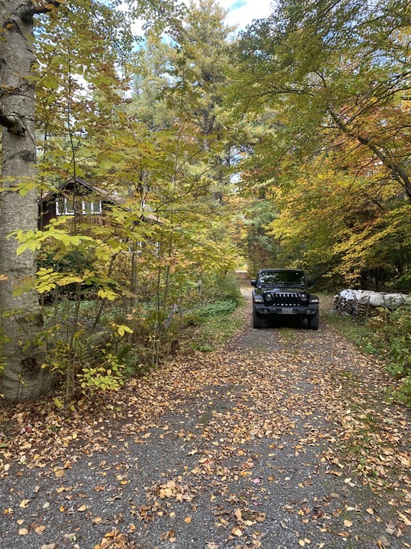 241 Sandisfield Road Sandisfield, MA 01255 - Photo 5 of 35 a view of car parked in city street