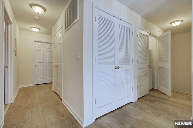 269 Main Street, Unit 2 Little Ferry, NJ 07643 - Photo 11 of 37 a view of a bathroom with wooden floor