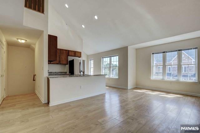 269 Main Street, Unit 2 Little Ferry, NJ 07643 - Photo 2 of 37 a view of kitchen and front door