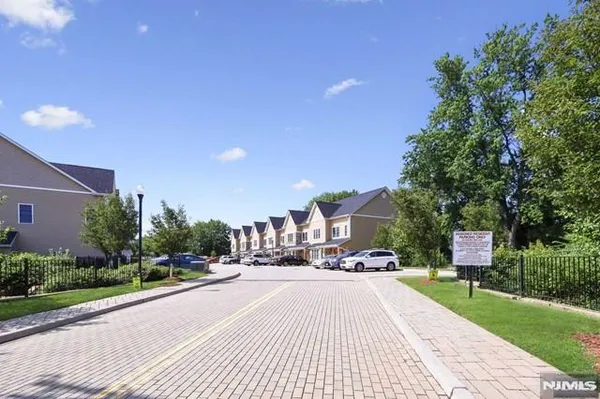 a view of the street with houses