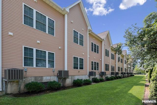 269 Main Street, Unit 2 Little Ferry, NJ 07643 - Photo 6 of 37 a view of house with yard