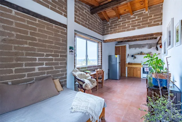 a living room with a couch and a table