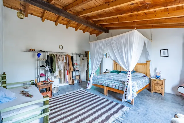 a view of a livingroom with furniture and windows