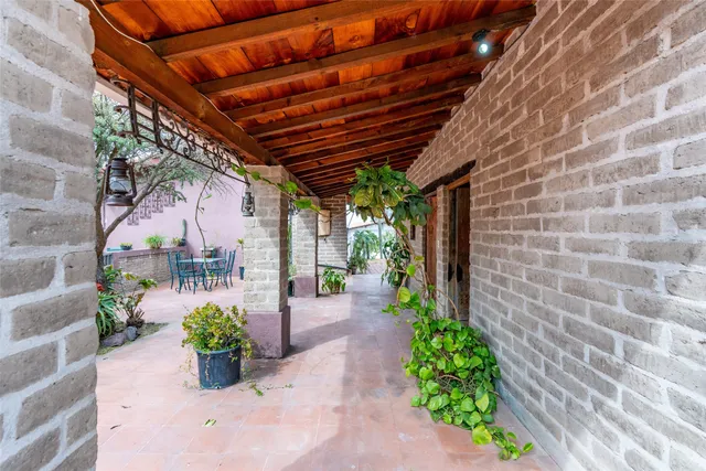 a view of a tables and chairs in the patio