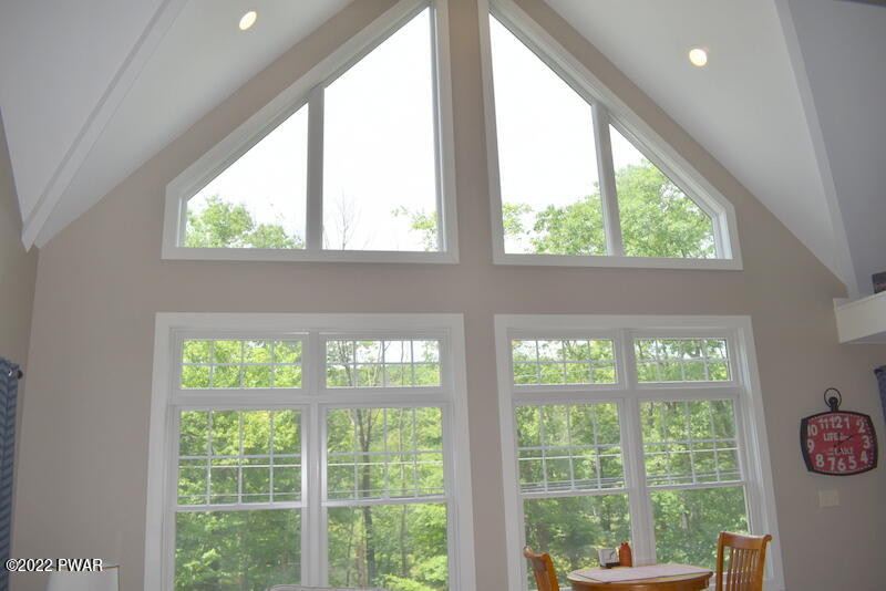 549 Finn Swamp Road Lakeville, PA 18438 - Photo 9 of 35 a view of a green field with wooden floor