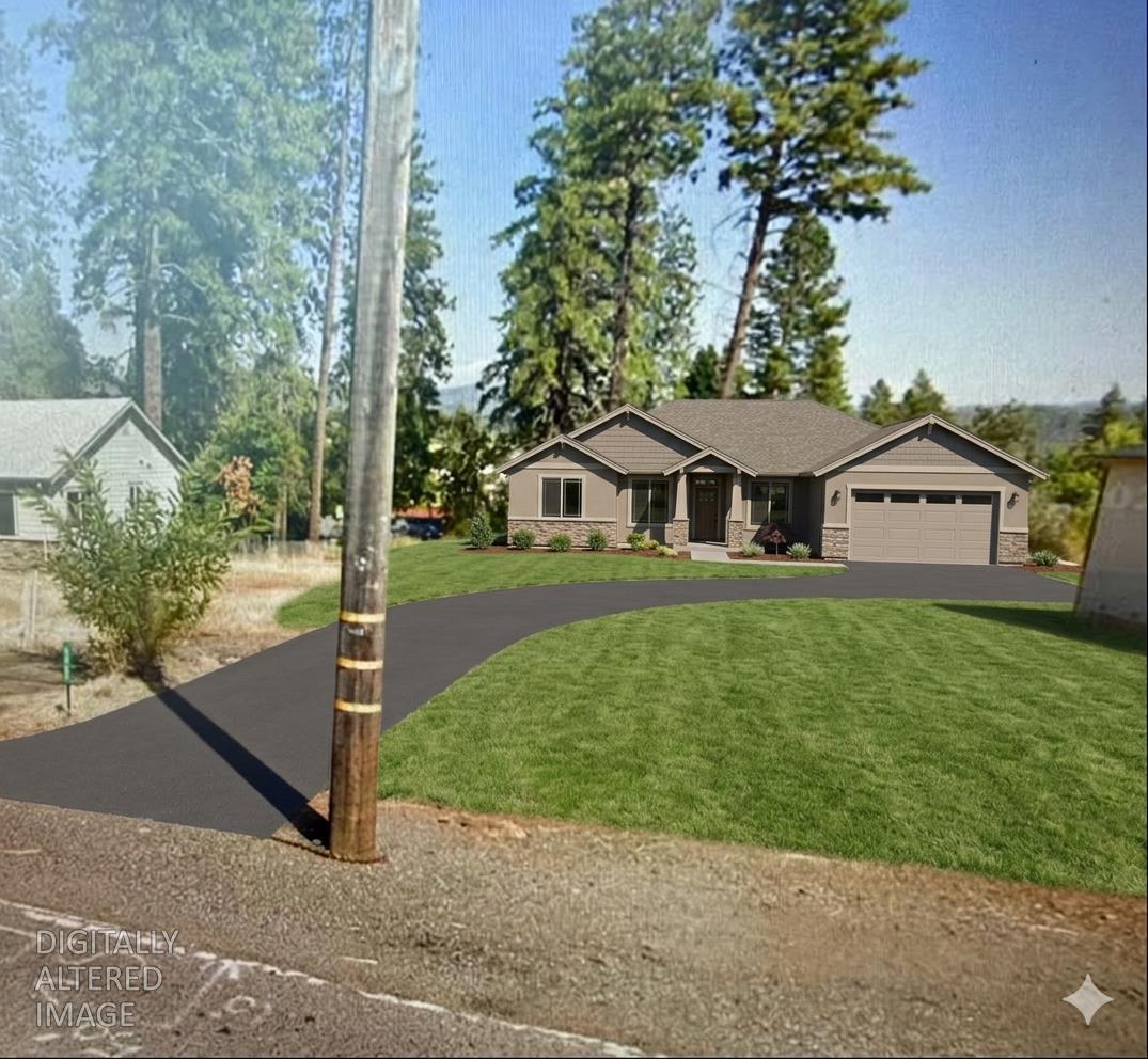 5448 Pentz Road Paradise, CA 95969 - Photo 2 of 9 Added the lawn, driveway as well as the home situated towards the back of the plot using AI. This was done to help buyers visualize the possible placement of a home on the vacant land.