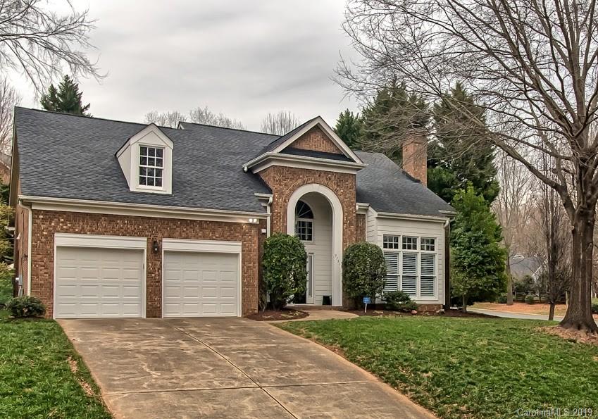 9731 Deer Spring Lane Charlotte, NC 28210 - Photo 2 of 26 front view of a house with a yard