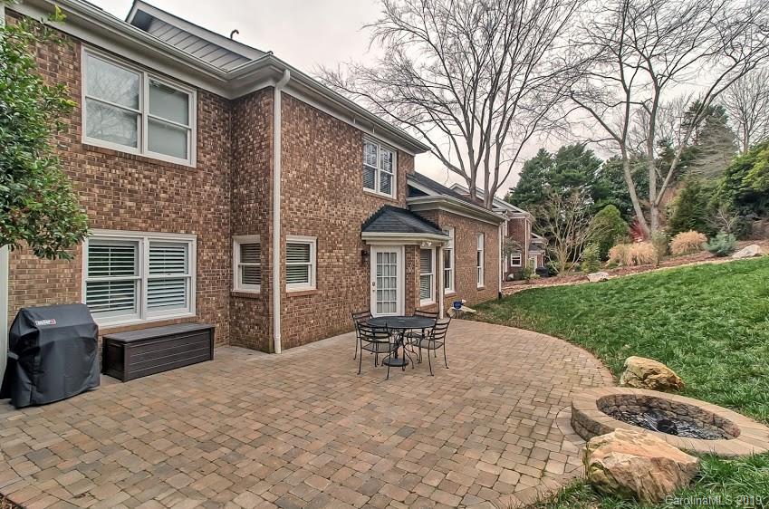 9731 Deer Spring Lane Charlotte, NC 28210 - Photo 18 of 26 a view of a house with backyard and sitting area
