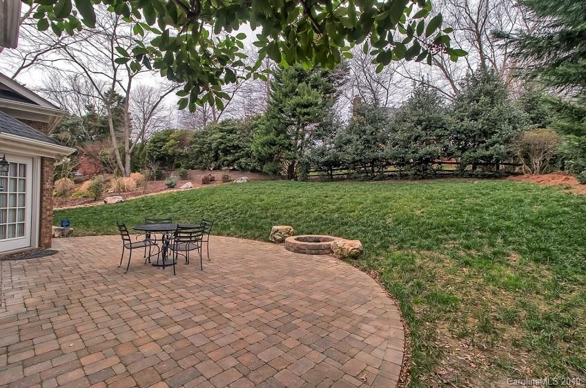 9731 Deer Spring Lane Charlotte, NC 28210 - Photo 19 of 26 a view of a backyard with sitting area