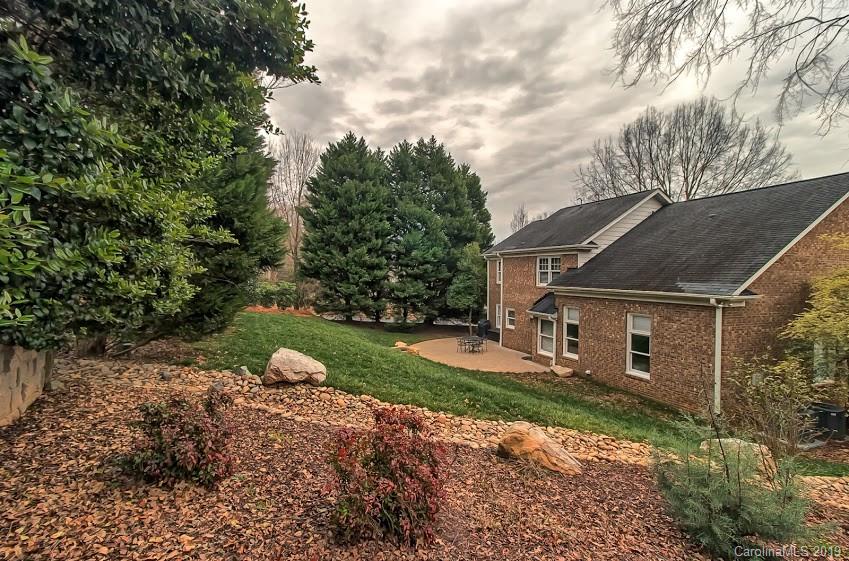 9731 Deer Spring Lane Charlotte, NC 28210 - Photo 20 of 26 a view of a back yard of the house