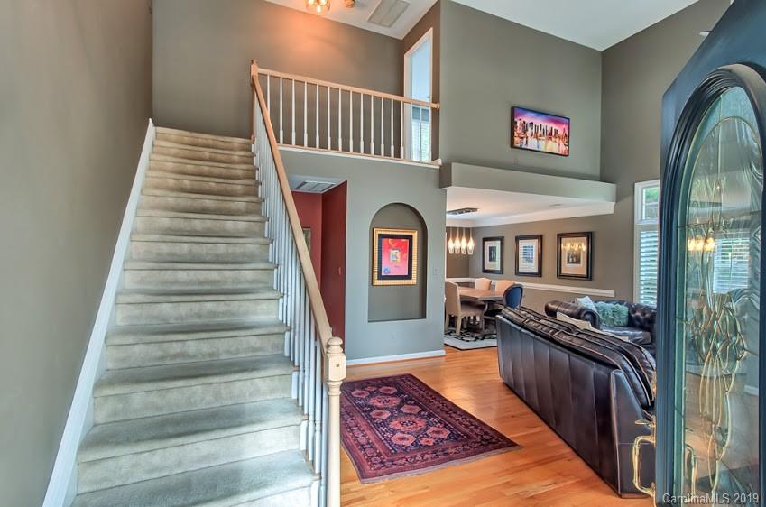 9731 Deer Spring Lane Charlotte, NC 28210 - Photo 3 of 26 a view of entryway and hall with wooden floor