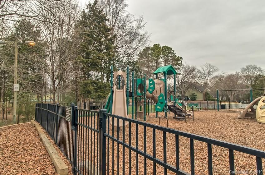 9731 Deer Spring Lane Charlotte, NC 28210 - Photo 25 of 26 a view of a park with large trees