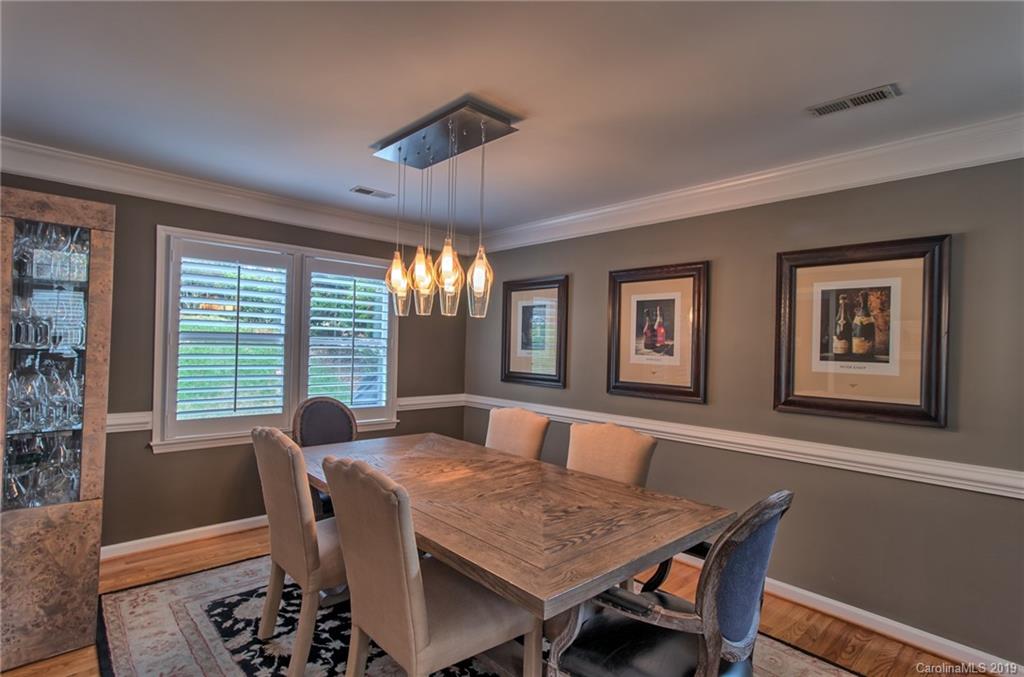 9731 Deer Spring Lane Charlotte, NC 28210 - Photo 5 of 26 a view of a dining room with furniture window and outside view