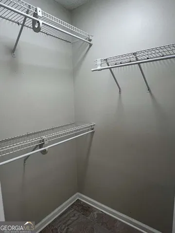 a view of a room with racks on the wall