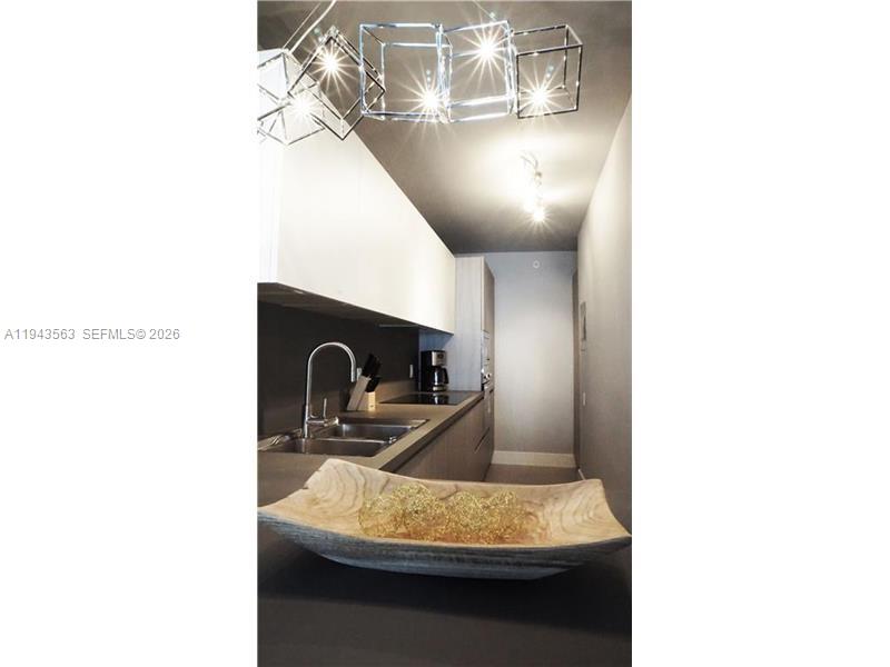 100 Lincoln Road, Unit 420 Miami Beach, FL 33139 - Photo 11 of 25 a room with a sink