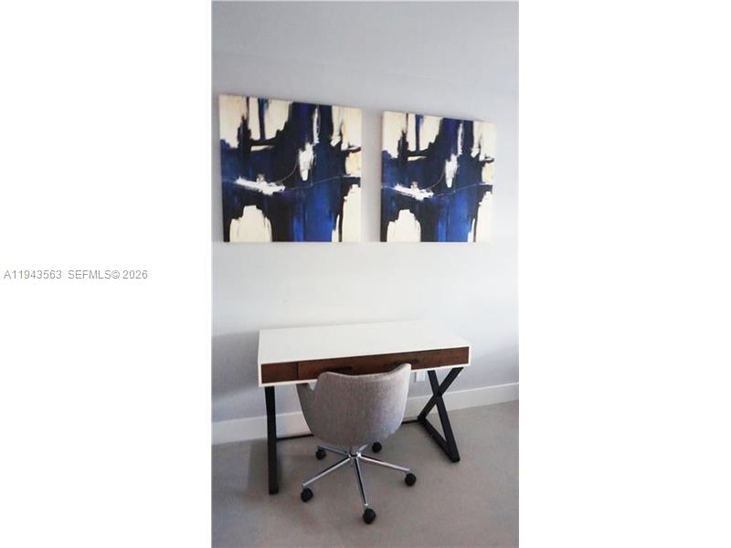 100 Lincoln Road, Unit 420 Miami Beach, FL 33139 - Photo 14 of 25 a view of a room with a dining table and chairs