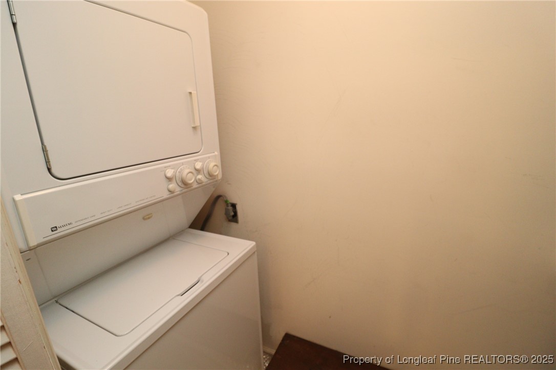6120 Sunpointe Drive, Unit 205 Raleigh, NC 27606 - Photo 13 of 32 a utility room with dryer and washer