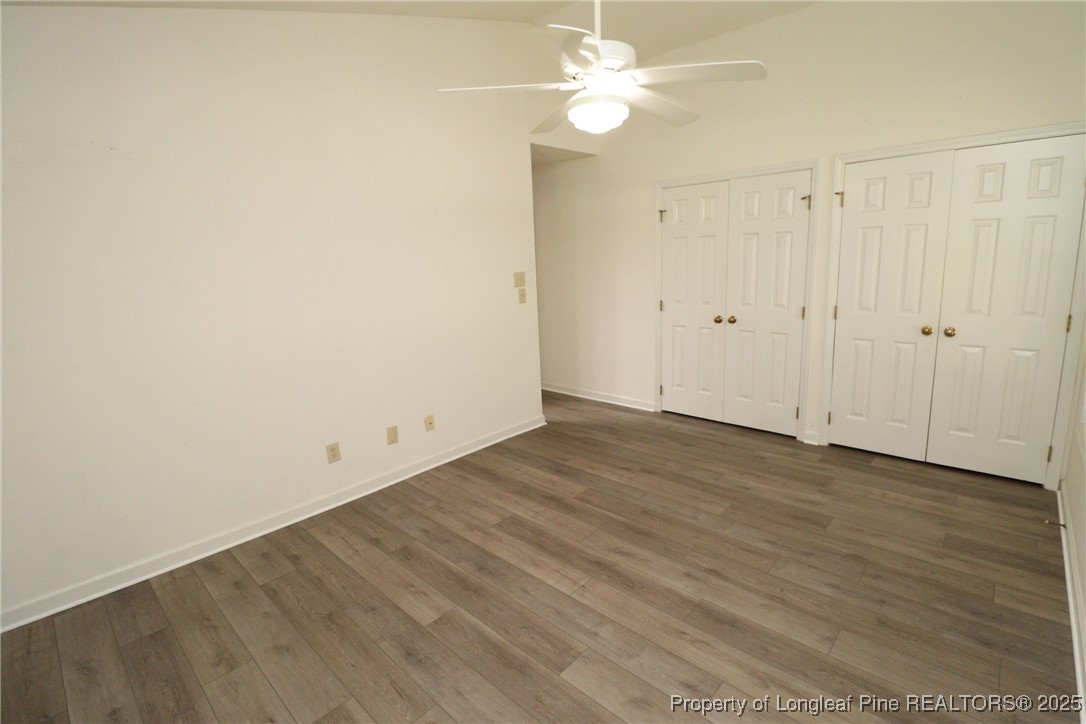 6120 Sunpointe Drive, Unit 205 Raleigh, NC 27606 - Photo 20 of 32 a view of a room with wooden floor