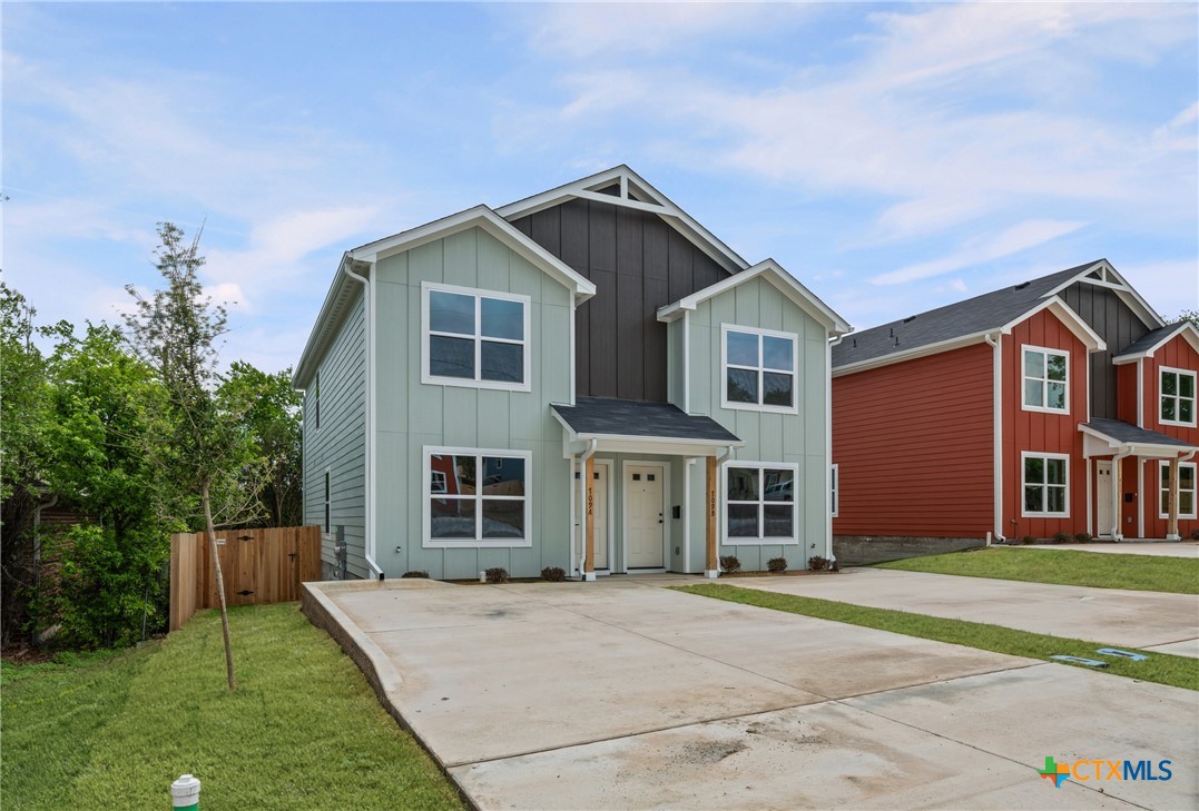 709 South 28th Street, Unit A Temple, TX 76501 - Photo 2 of 26 a front view of a house with a garden