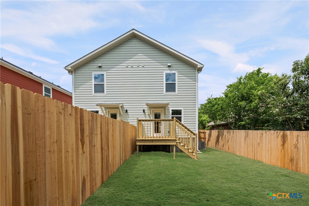 709 South 28th Street, Unit A Temple, TX 76501 - Photo 5 of 26 a view of backyard with deck